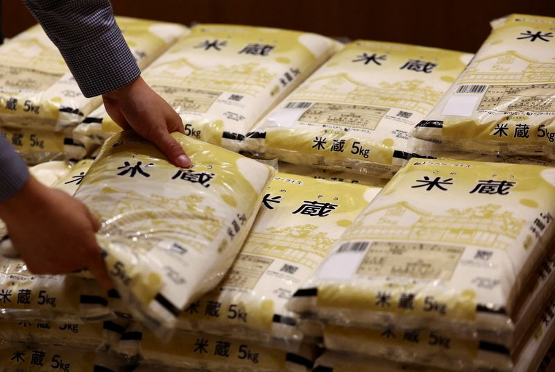 FILE PHOTO: Government-stockpiled rice aiming at resolving persisting price rises displayed at Ito-Yokado grocery store, a subsidiary of Seven & i Holdings, in Tokyo, Japan May 31, 2025.  REUTERS/Issei Kato/File Photo
