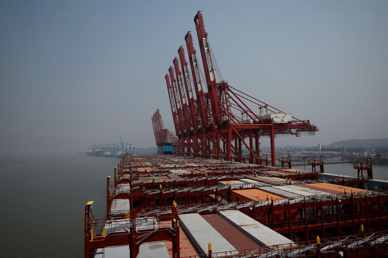FILE PHOTO: Maersk shipping containers are stored aboard the ‘Albert Maersk’ at the APM Terminals, in Navi Mumbai, India, February 28, 2025. REUTERS/Francis Mascarenhas/File Photo