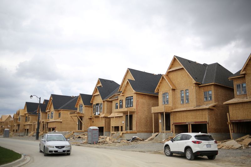 FILE PHOTO: A row of houses under construction are seen at a subdivision near the town of Kleinburg, Ontario, Canada May 13, 2017. REUTERS/Chris Helgren/ File Photo