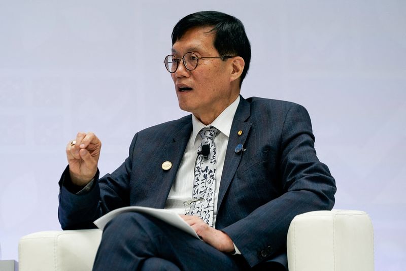 FILE PHOTO: Rhee Chang-yong, Governor of the Bank of Korea, participates in a panel titled “How Should Central Banks Battle High Inflation?” at the 2023 Spring Meetings of the World Bank Group and the International Monetary Fund in Washington, U.S., April 14, 2023. REUTERS/Elizabeth Frantz/File Photo