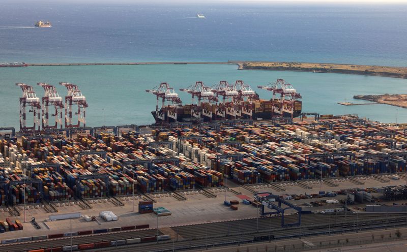 Shipping containers are seen at the port in Barcelona, Spain, December 7, 2024. REUTERS/Jon Nazca/File Photo