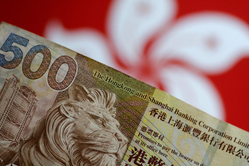 FILE PHOTO: A Hong Kong dollar note is seen in this illustration photo May 31, 2017.     REUTERS/Thomas White/Illustration/File Photo