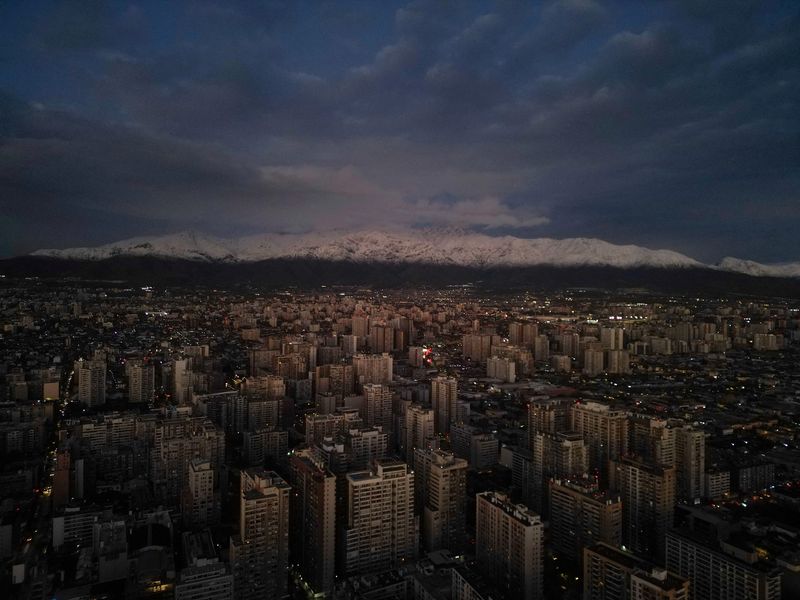 FILE PHOTO: A drone view shows the city of Santiago after rains, in Santiago, Chile, June 12, 2025. REUTERS/Juan Gonzalez/File Photo