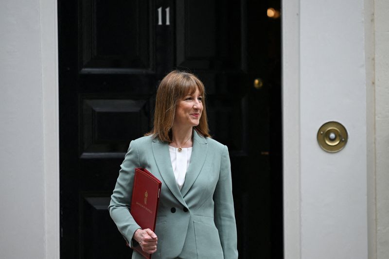 FILE PHOTO: Britain's Chancellor of the Exchequer Rachel Reeves leaves 11 Downing Street, ahead of presenting the Spending Review to Parliament, in London, Britain, June 11, 2025. REUTERS/Jaimi Joy/File Photo