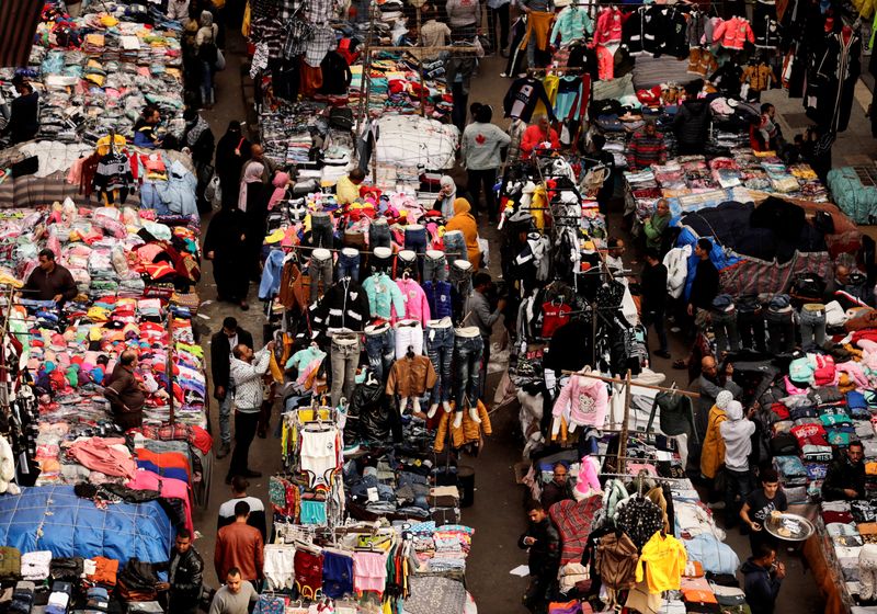 FILE PHOTO: People shop at Al Ataba, a popular market in downtown Cairo,  Egypt, December 4, 2022. REUTERS/Mohamed Abd El Ghany/File Photo