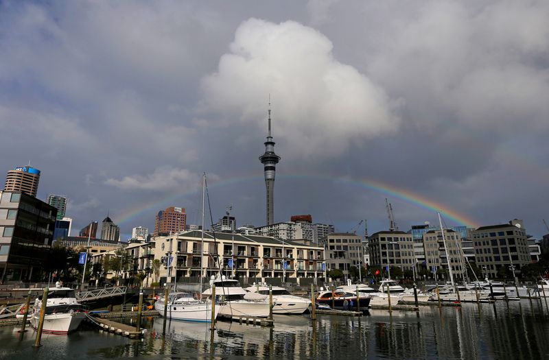 FILE PHOTO: A rainbow appears on the Auckland skyline featuring Sky Tower in New Zealand, July 8, 2017.  REUTERS/Jason Reed/ File Photo