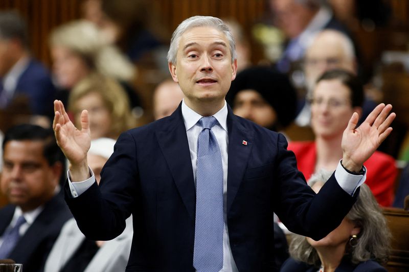 FILE PHOTO: Canada's Minister of Finance Francois-Philippe Champagne speaks during Question Period in the House of Commons on Parliament Hill in Ottawa, Ontario, Canada May 29, 2025. REUTERS/Blair Gable/File Photo