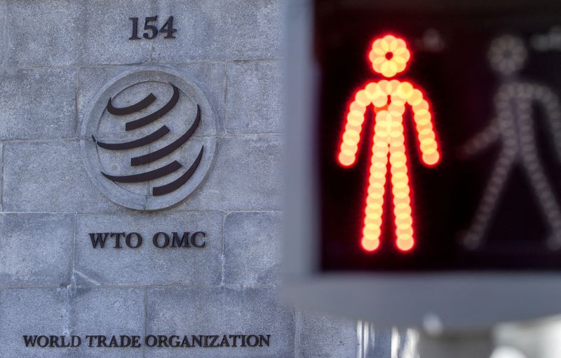 FILE PHOTO: A logo is seen at the World Trade Organization (WTO) headquarters before a news conference in Geneva, Switzerland, October 5, 2022. REUTERS/Denis Balibouse/File Photo
