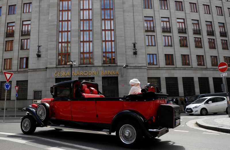 A car drives past the Czech National Bank in Prague, Czech Republic, April 26, 2023. REUTERS/David W Cerny/File Photo
