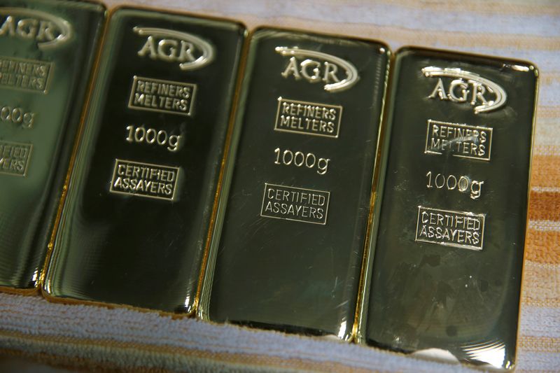 FILE PHOTO: Gold bars weighing 1kg are seen at AGR (African Gold Refinery) in Entebbe, Uganda, October 4, 2018. Picture taken October 4, 2018. REUTERS/Baz Ratner/File photo