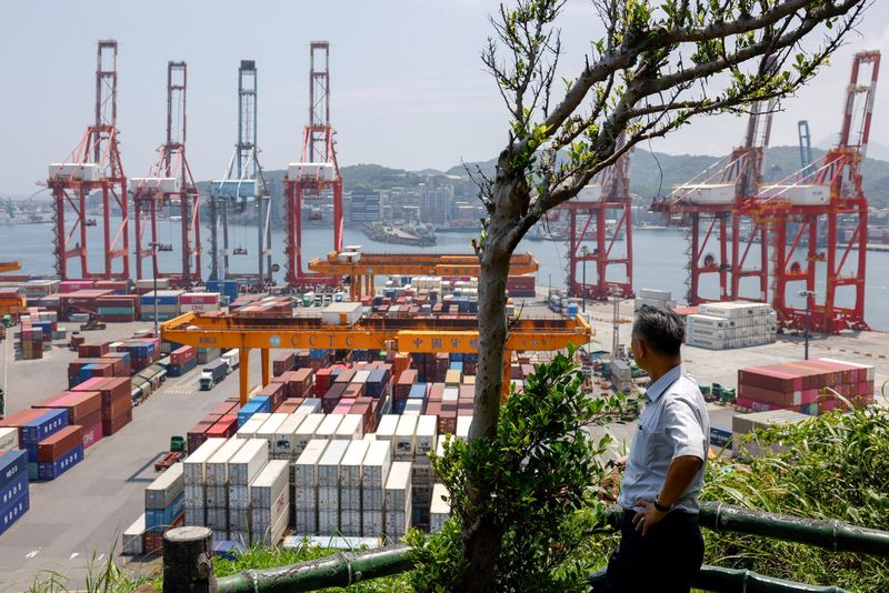Containers and equipment sit at the Port of Keelung, Taiwan, August 7, 2025. REUTERS/Ann Wang/File Photo