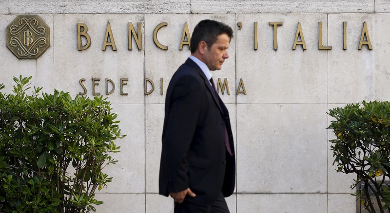 A man walks past a Bank of Italy sign in Rome, Italy April 11, 2016. To match Exclusive BANKOFCHINA-ITALY/   REUTERS/Tony Gentile/ File Photo