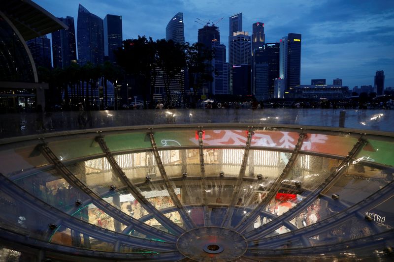 FILE PHOTO: A view of the city skyline in Singapore December 31, 2020. Picture taken December 31, 2020.  REUTERS/Edgar Su/File Photo