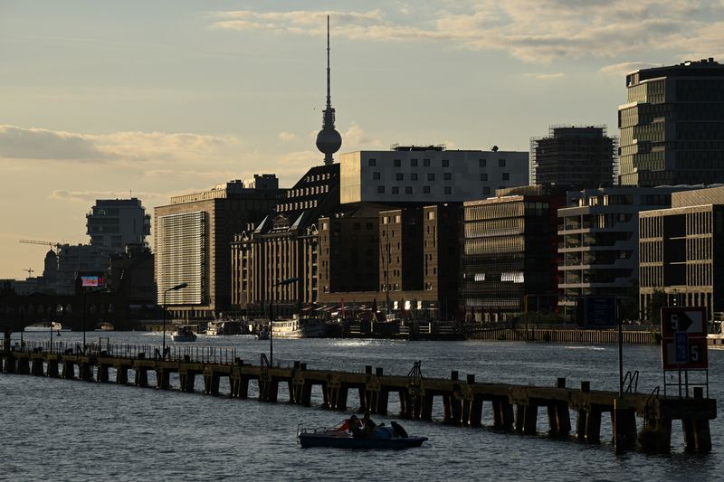 Buildings on the bank of the River Spree and the television tower in Berlin, Germany, August 17, 2025.  REUTERS/Annegret Hilse