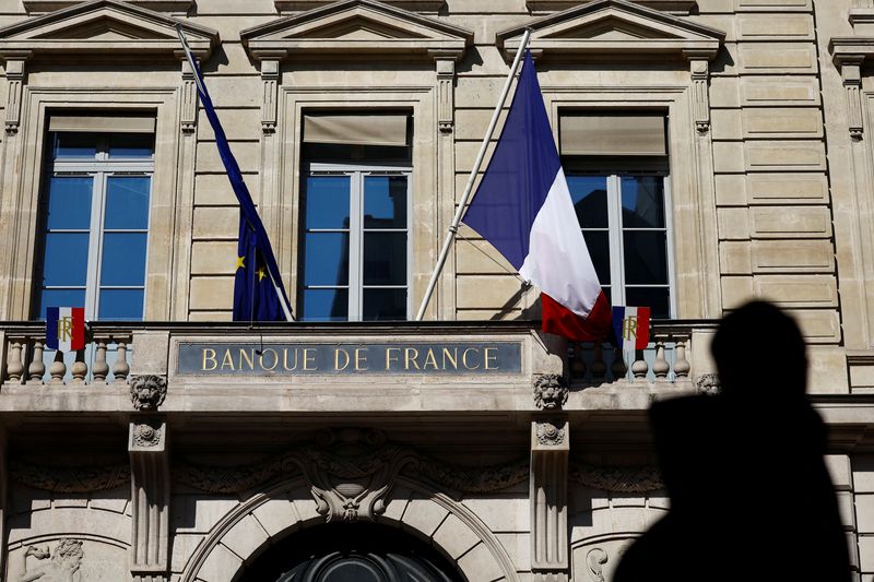 A French flag flies at the entrance of the Bank of France "Banque de France" building in Paris, France April 9, 2025.  REUTERS/Abdul Saboor