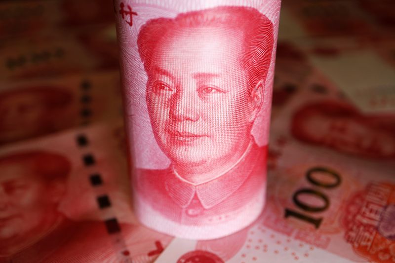 Chinese Yuan banknotes are seen in this illustration picture taken June 14, 2022. REUTERS/Florence Lo/Illustration