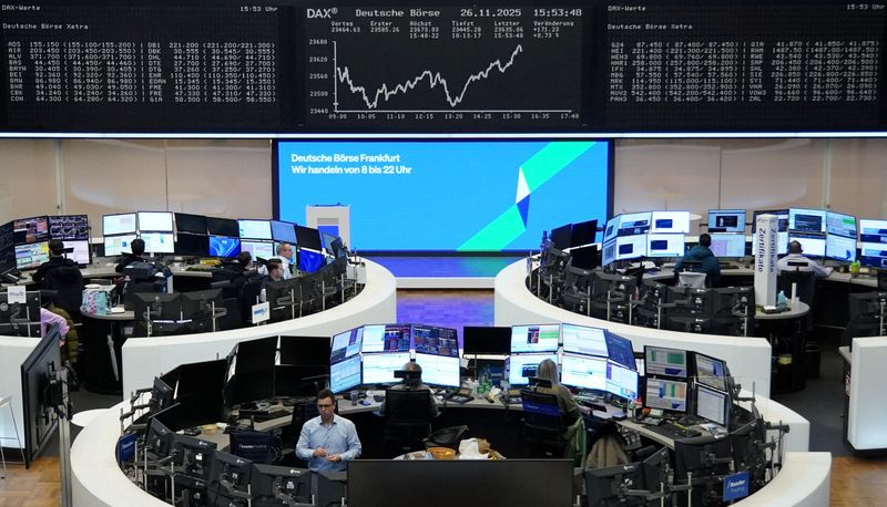 A graph of the German share price index DAX is displayed at the stock exchange in Frankfurt, Germany, November 26, 2025. REUTERS/Staff