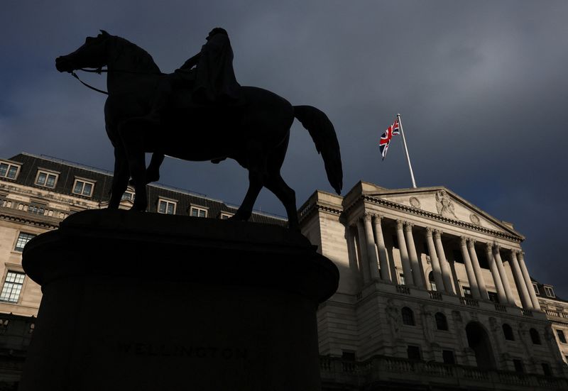 A British Union Jack flag flies on the Bank of England building in the City of London financial district, London, Britain, November 7, 2025. REUTERS/Toby Melville