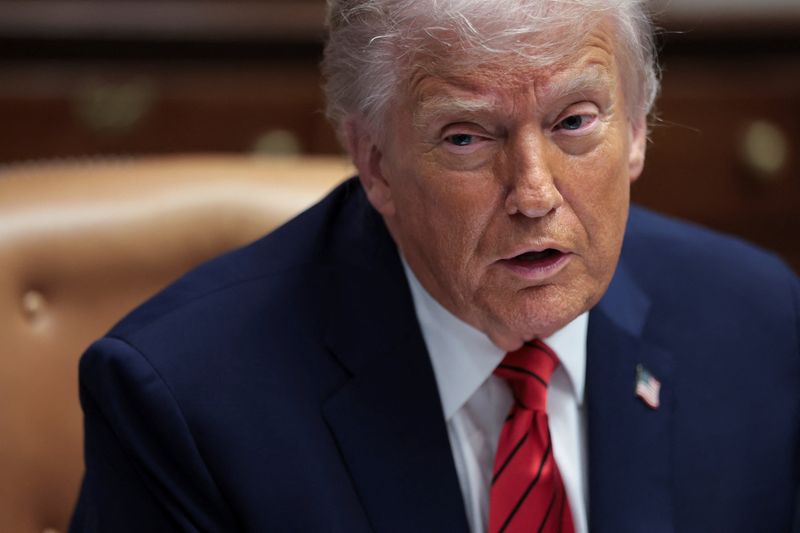 U.S. President Donald Trump participates in a roundtable discussion with business leaders at the White House in Washington, D.C., U.S., December 10, 2025. REUTERS/Jonathan Ernst