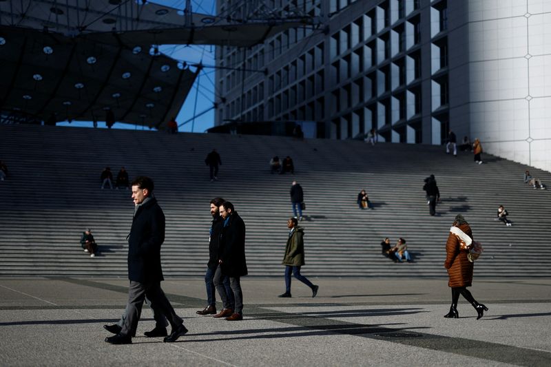 People walk on the esplanade of La Defense in the financial and business district of La Defense, near Paris, France, January 27, 2025. REUTERS/Sarah Meyssonnier/File Photo