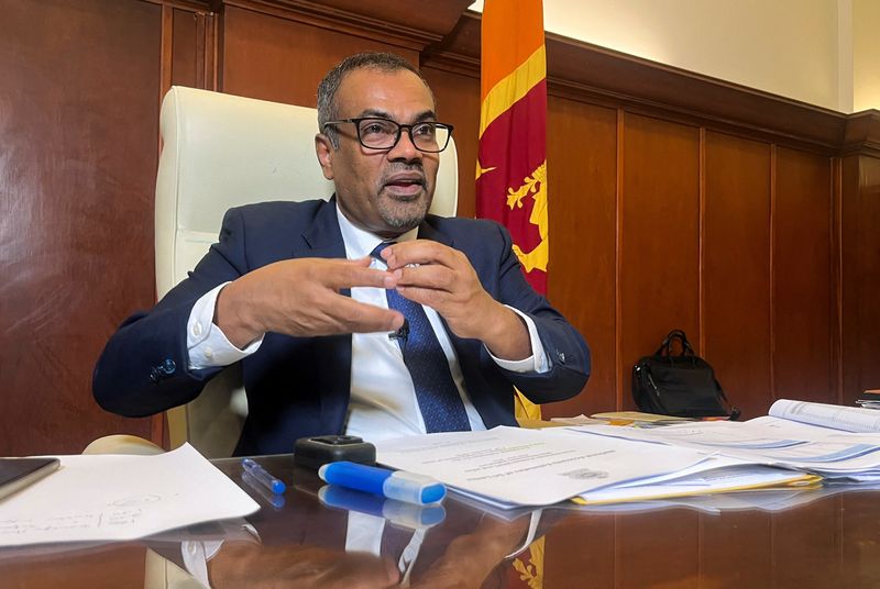 Sri Lanka's Deputy Finance Minister Anil Jayantha Fernando speaks during an interview in Colombo, Sri Lanka December 17, 2025. REUTERS/Channa Kumara