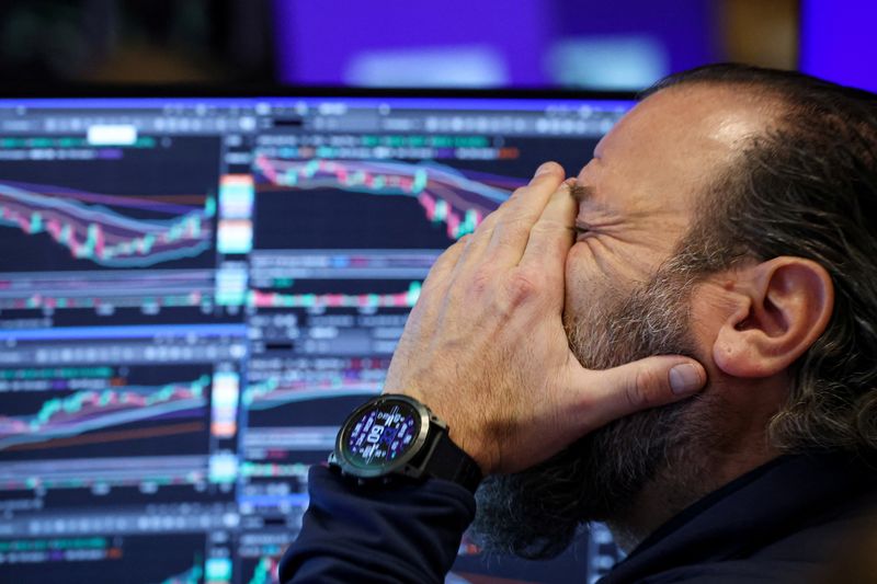 A trader works on the floor at the New York Stock Exchange (NYSE) in New York City, U.S., January 15, 2026.  REUTERS/Brendan McDermid