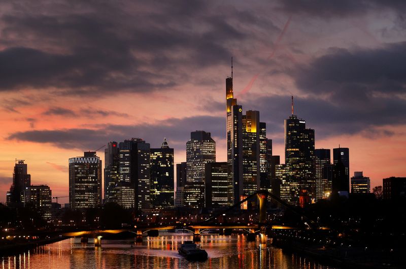 The skyline with its office buildings and the banking district are photographed during sunset in Frankfurt, Germany, November 18, 2021.  REUTERS/Kai Pfaffenbach/File Photo