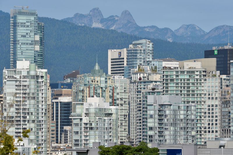 Condominium and office towers are seen on the mountain-backed skyline of Vancouver, British Columbia, Canada September 30, 2020. REUTERS/Jennifer Gauthier