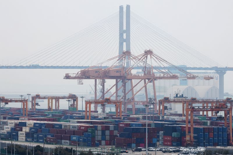 Cranes and shipping containers are seen at Pyeongtaek port in Pyeongtaek, South Korea, April 2, 2025.   REUTERS/Kim Hong-Ji