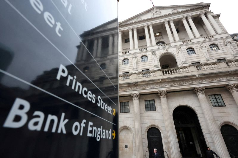 FILE PHOTO: A direction sign is seen near the Bank of England building in London, Britain, February 3, 2025.  REUTERS/Toby Melville/File Photo