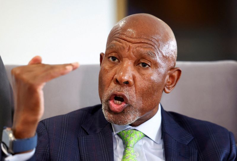 FILE PHOTO: South African Reserve Bank Governor Lesetja Kganyago gestures during an  interview with Reuters in Sandton, South Africa, October 30, 2025. REUTERS/Siphiwe Sibeko/File Photo