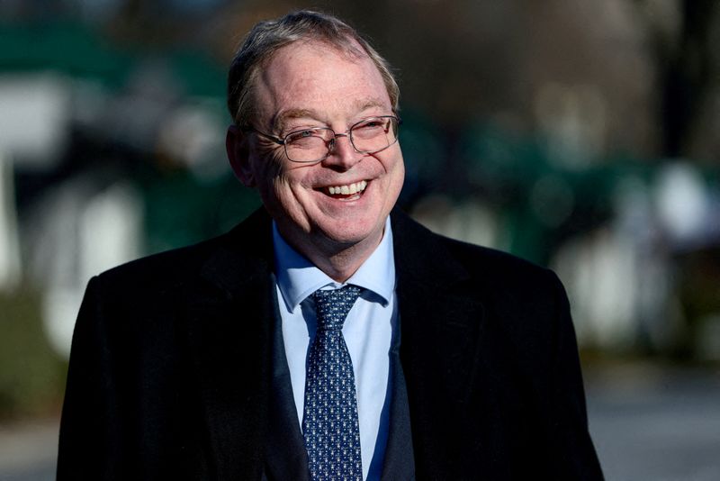FILE PHOTO: Kevin Hassett, director of the National Economic Council, speaks to the media outside the White House in Washington, D.C., U.S., December 16, 2025. REUTERS/Evelyn Hockstein/File Photo