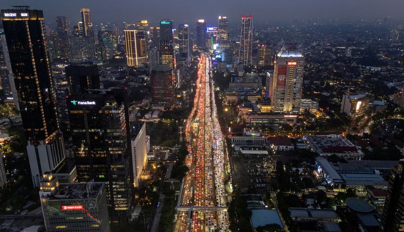 FILE PHOTO: A drone view shows traffic during evening rush hours at the business district in Jakarta, Indonesia, February 3, 2026. REUTERS/Willy Kurniawan/ File Photo