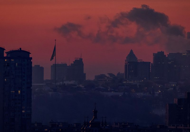 FILE PHOTO: Water vapour rises from residential buildings' autonomous heating systems during a power blackout and freezing temperatures, after critical civil infrastructure was hit by recent Russian missile and drone attacks, amid Russia's attack on Ukraine, in Kyiv, Ukraine January 19, 2026. REUTERS/Vladyslav Sodel/File Photo