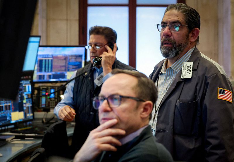Traders work on the floor at the New York Stock Exchange (NYSE) in New York City, U.S., February 25, 2026.  REUTERS/Brendan McDermid
