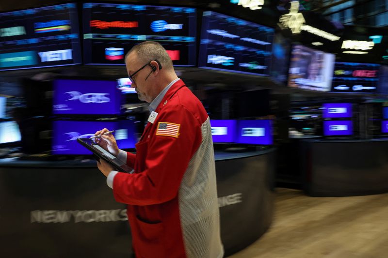 A trader works on the floor at the New York Stock Exchange (NYSE) in New York City, U.S., March 3, 2026.  REUTERS/Brendan McDermid