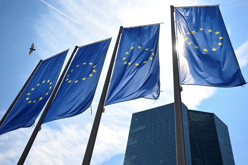 FILE PHOTO: EU flags flutter in front of European Central Bank (ECB) headquarters in Frankfurt, Germany July 18, 2024. REUTERS/Jana Rodenbusch/File Photo