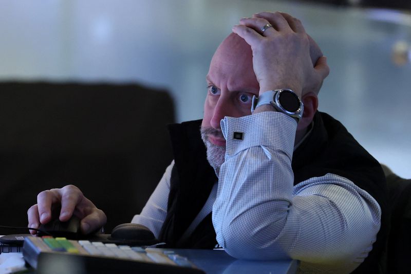 A trader works on the floor at the New York Stock Exchange (NYSE) in New York City, U.S., March 5, 2026. REUTERS/Brendan McDermid