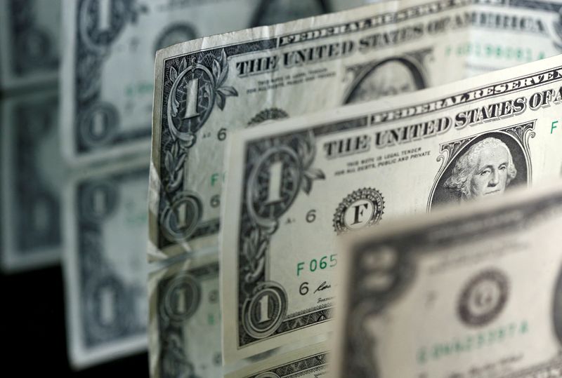 FILE PHOTO: Dollar banknotes are seen in this picture illustration taken April 28, 2017. REUTERS/Dado Ruvic/Illustration/File Photo