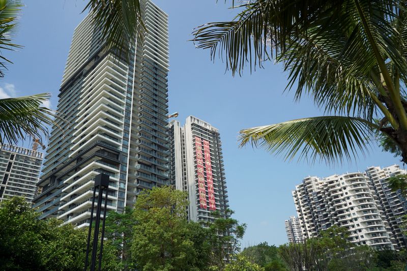 A sale sign is seen on a residential building in Huizhou, Guangdong province, China October 10, 2024. REUTERS/Nicoco Chan