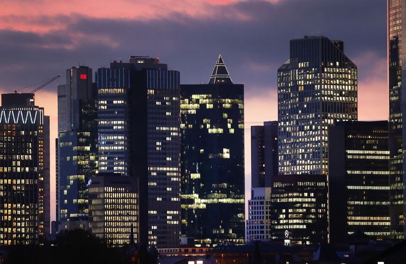 FILE PHOTO: The skyline with its office buildings and the banking district are photographed during sunset in Frankfurt, Germany, November 18, 2021. REUTERS/Kai Pfaffenbach/File Photo