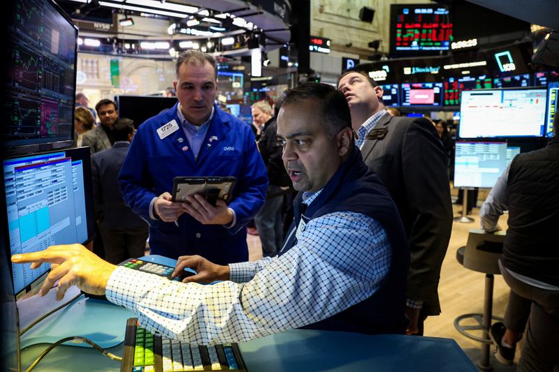 Traders work on the floor at the New York Stock Exchange (NYSE) in New York City, U.S., February 27, 2026.  REUTERS/Brendan McDermid