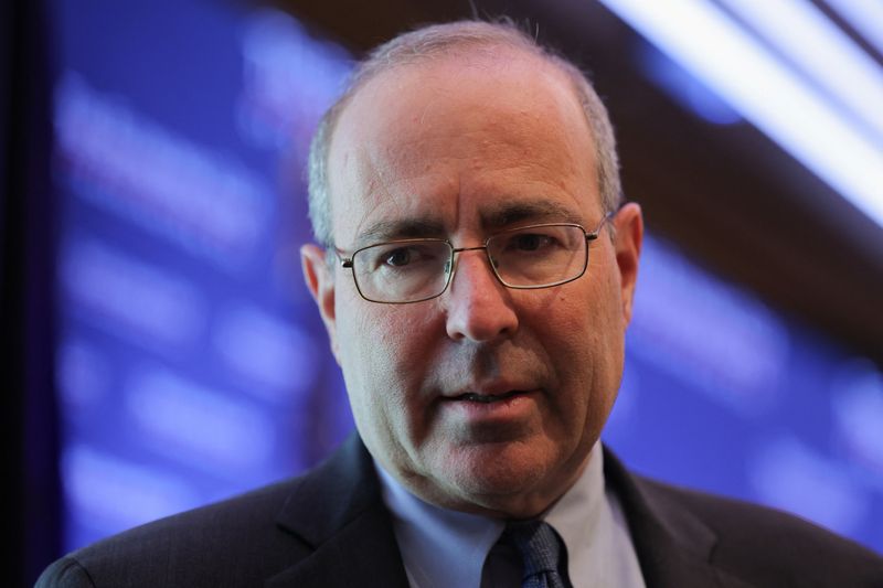 FILE PHOTO: Federal Reserve Bank of Richmond President Thomas Barkin looks on at the Economic Club of Washington DC in Washington, D.C., U.S., April 9, 2025. REUTERS/Kevin Mohatt/File Photo