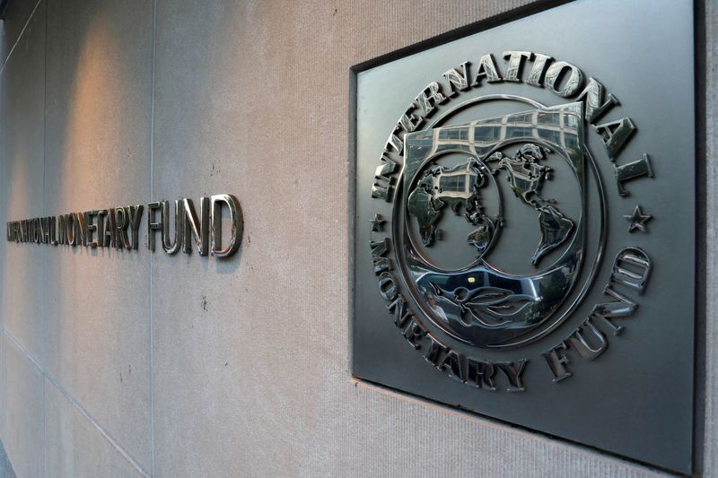 FILE PHOTO: FILE PHOTO: International Monetary Fund (IMF) logo is seen outside the headquarters building in Washington, U.S., September 4, 2018. REUTERS/Yuri Gripas/File Photo