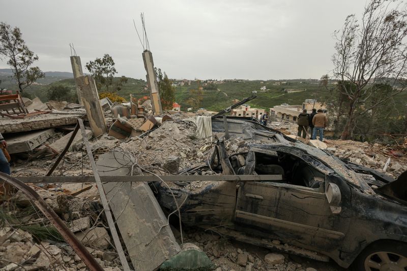 A destroyed car among the rubble of a house hit by an Israeli strike, amid escalating hostilities between Israel and Hezbollah, as the U.S.-Israel conflict with Iran continues, in Houmine El Tahta, Lebanon, April 1, 2026. REUTERS/Yara Nardi