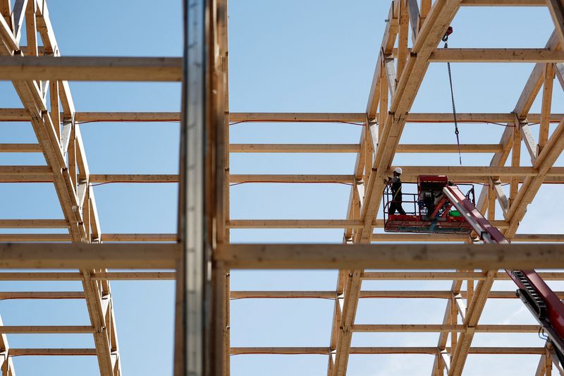 A worker continues to dismantle the Grand Palais Ephemere in Paris, France March 20, 2025. REUTERS/Benoit Tessier
