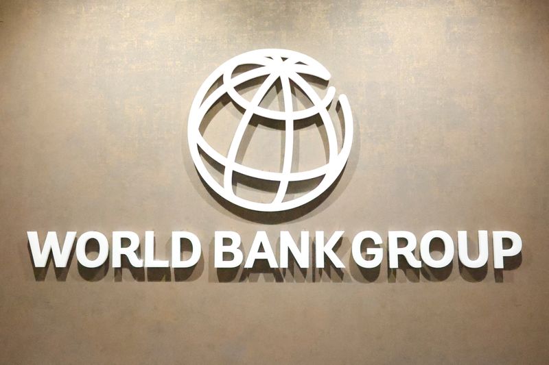 FILE PHOTO: The World Bank Group logo is displayed on a office wall at the International Finance Corporation (IFC) in Karachi, Pakistan February 4, 2026. REUTERS/Akhtar Soomro/File Photo