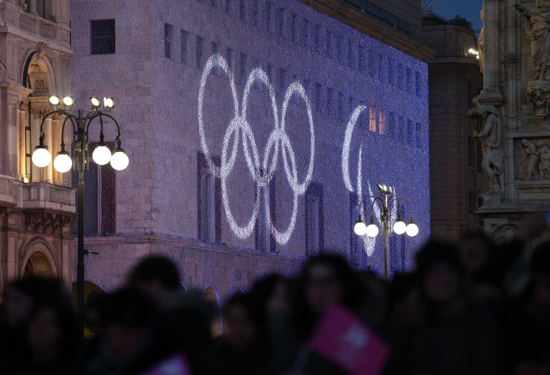 Winter Olympics - Christmas tree for 2026 Milano-Cortina Winter Olympics lit up in Milan - Piazza del Duomo, Milan, Italy - December 6, 2025 General view of the Olympic rings outside the Piazza del Duomo ahead of the lighting of the Christmas tree for 2026 Milano-Cortina Winter Olympics REUTERS/Claudia Greco