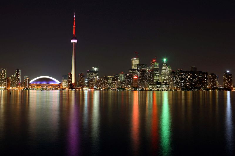 FILE PHOTO: June 24, 2009; Toronto, ON, Canada; A view of the Rogers Centre next to the CN Tower and the rest of the Toronto skyline as seen across Lake Ontario. Mandatory Credit: Tom Szczerbowski-US PRESSWIRE/ File Photo