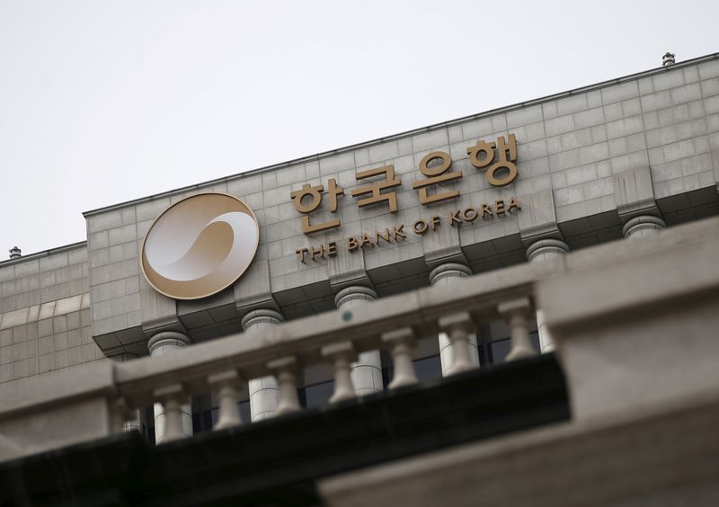 FILE PHOTO: The logo of the Bank of Korea is seen on the top of its building in Seoul, South Korea, March 8, 2016. REUTERS/Kim Hong-Ji/File Photo